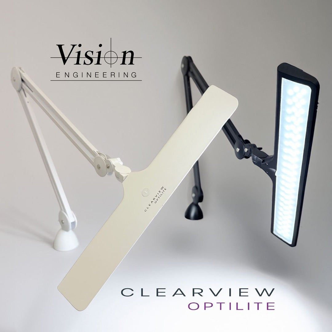 Two Clearview OPTILITE LED task lamps, one black, one white side by side.